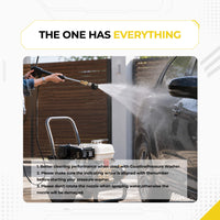 Deca 6-in-1 pressure washer nozzle in action blasting wide fan spray during a professional car wash setup next to a heavy-duty gas pressure washer machine.